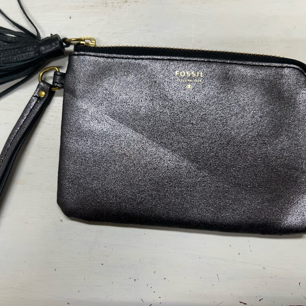 Fossil metallic wristlet with tassel